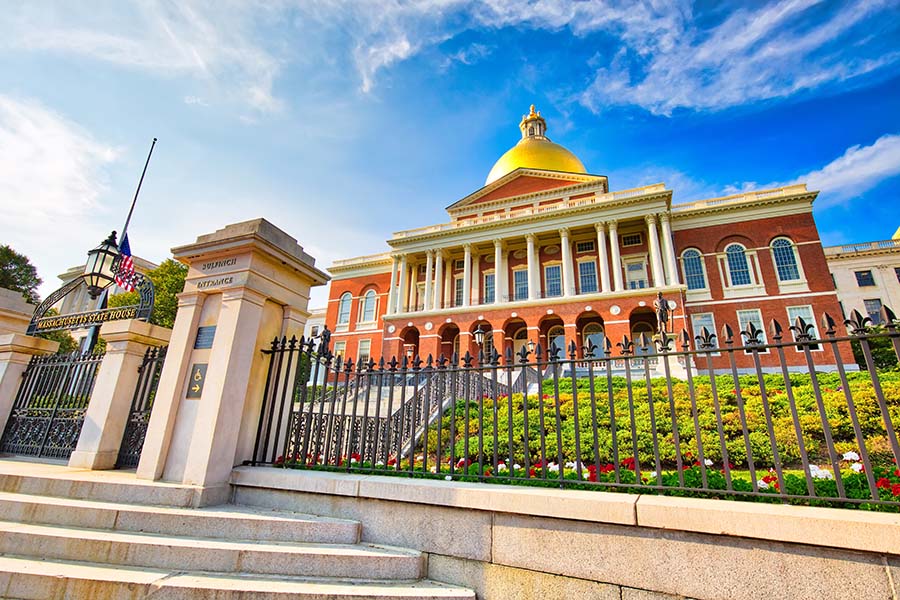 Insurance Quote - State Capital Building Against Blue Sky In Boston Massachusetts